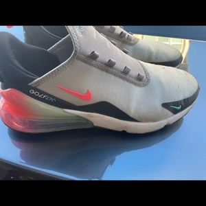 Awesome Nike Golf27c shoes. Works on turf or the course.